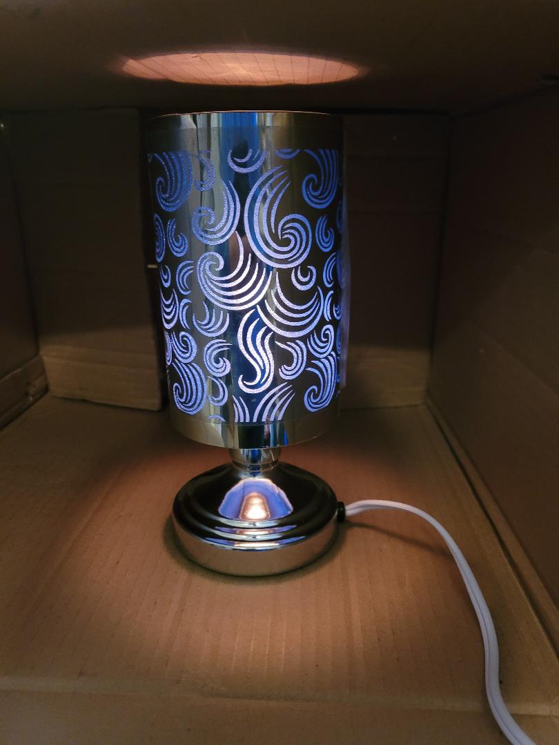 A unique color swirl color combo, electric metal touchlamp , oil wamrer and tart burner te53