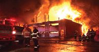 Fire destroys large truck garage