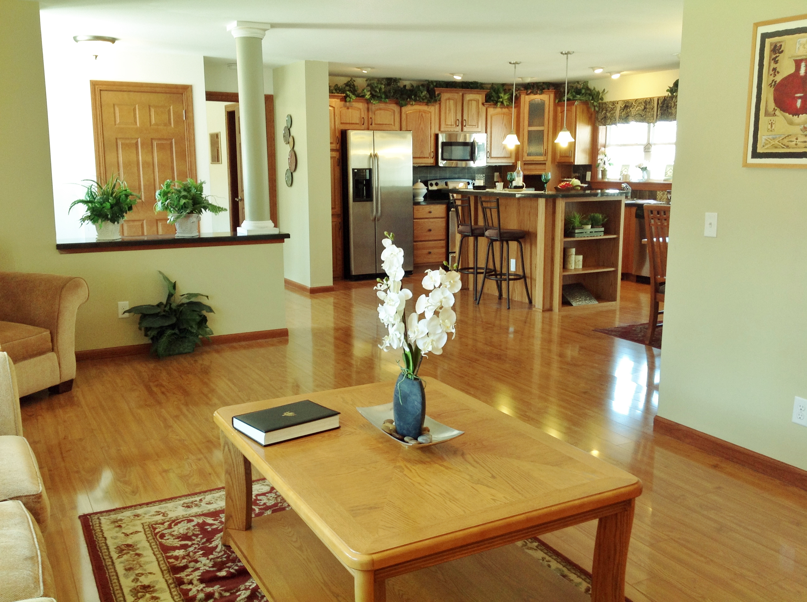 From living room back to foyer/kitchen.