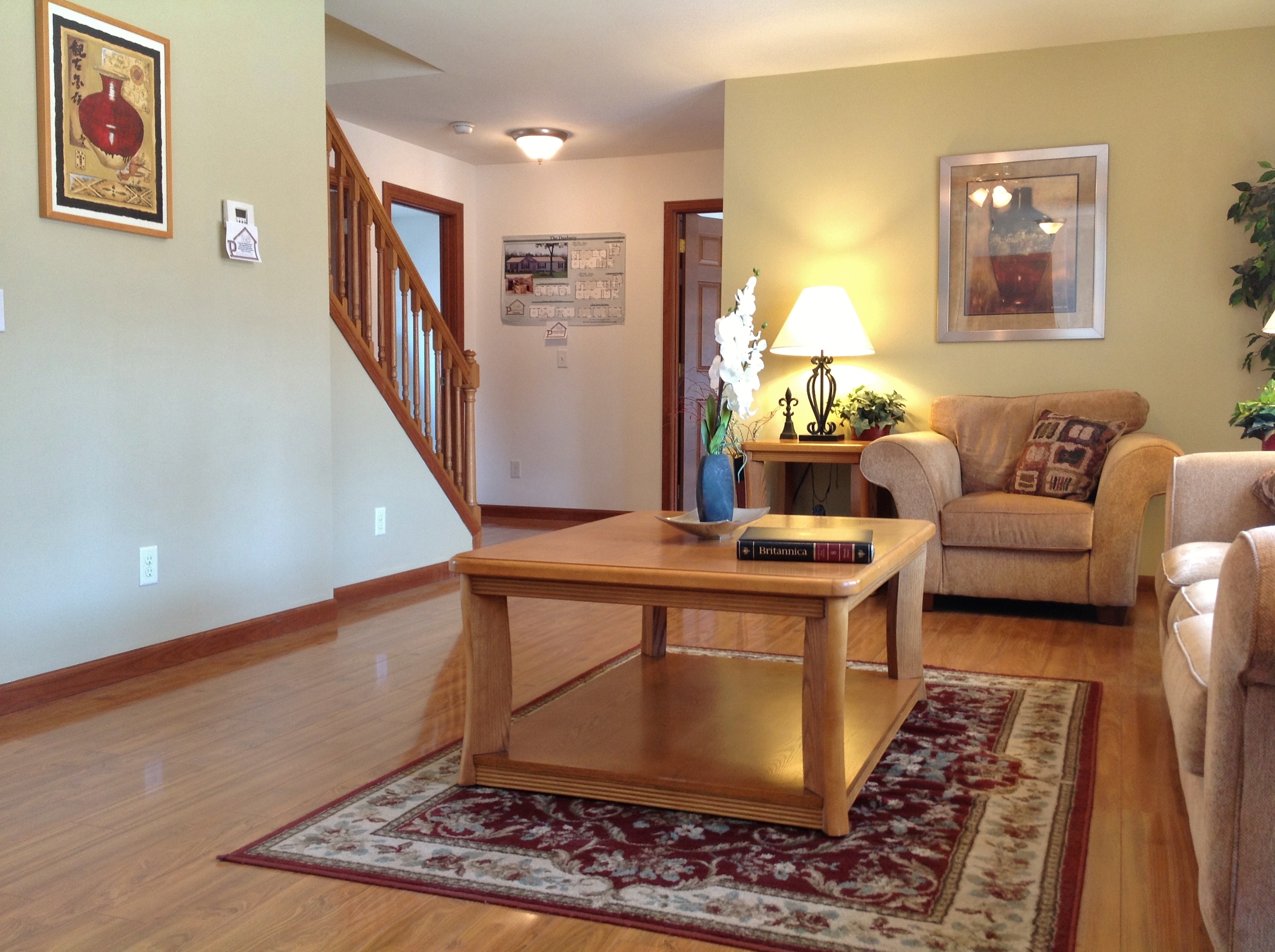 The stair is situated in off the living room.