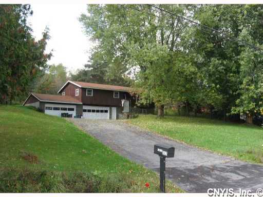 Great location between Manlius & Cazenovia, country setting with great view, open floor plan,nice yard with tree house with electric for the kids