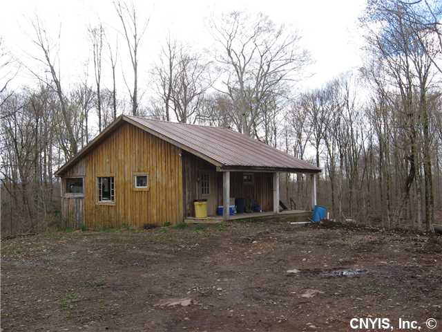 Great recreational property. Hunting,ATV,Snowmobile, very private and remote but yet not far from civilization. Has nice cabin with 2/3 bedrooms, indoor toilet, woodburning stove, propane heat and cooking, kitchen and living area, two story.