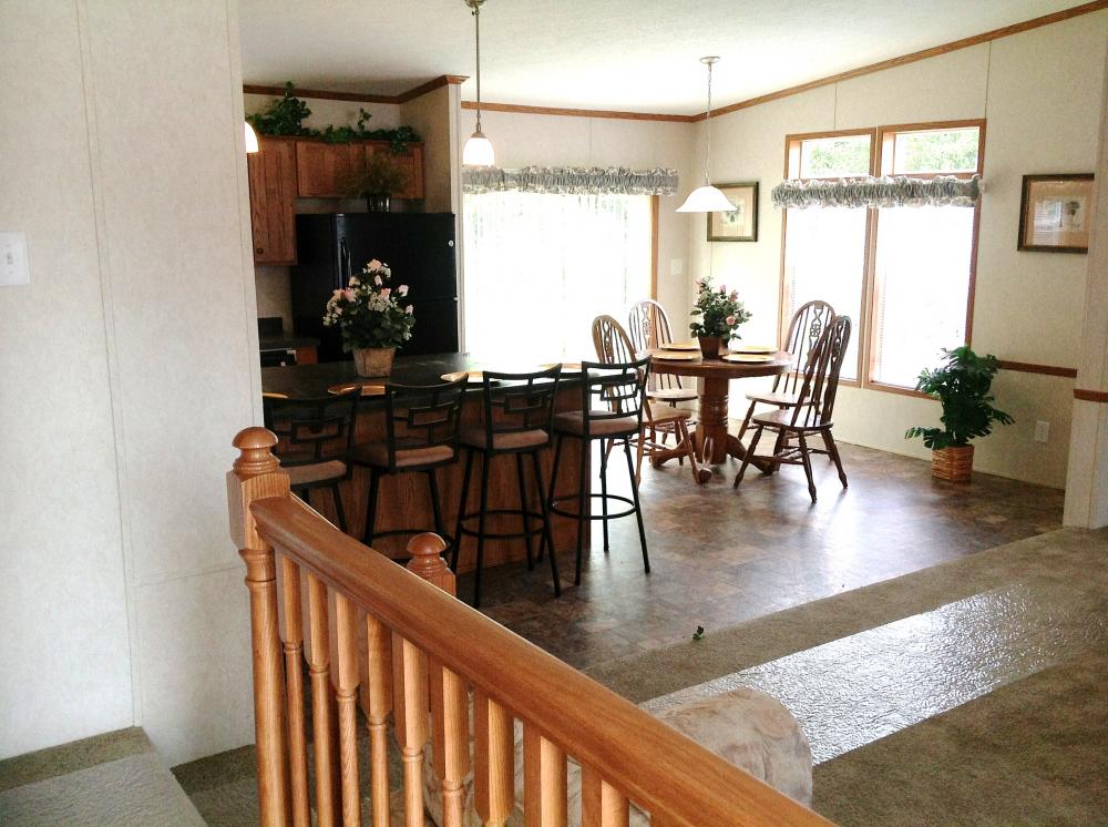 Step Down Living and Kitchen,Oak Railing