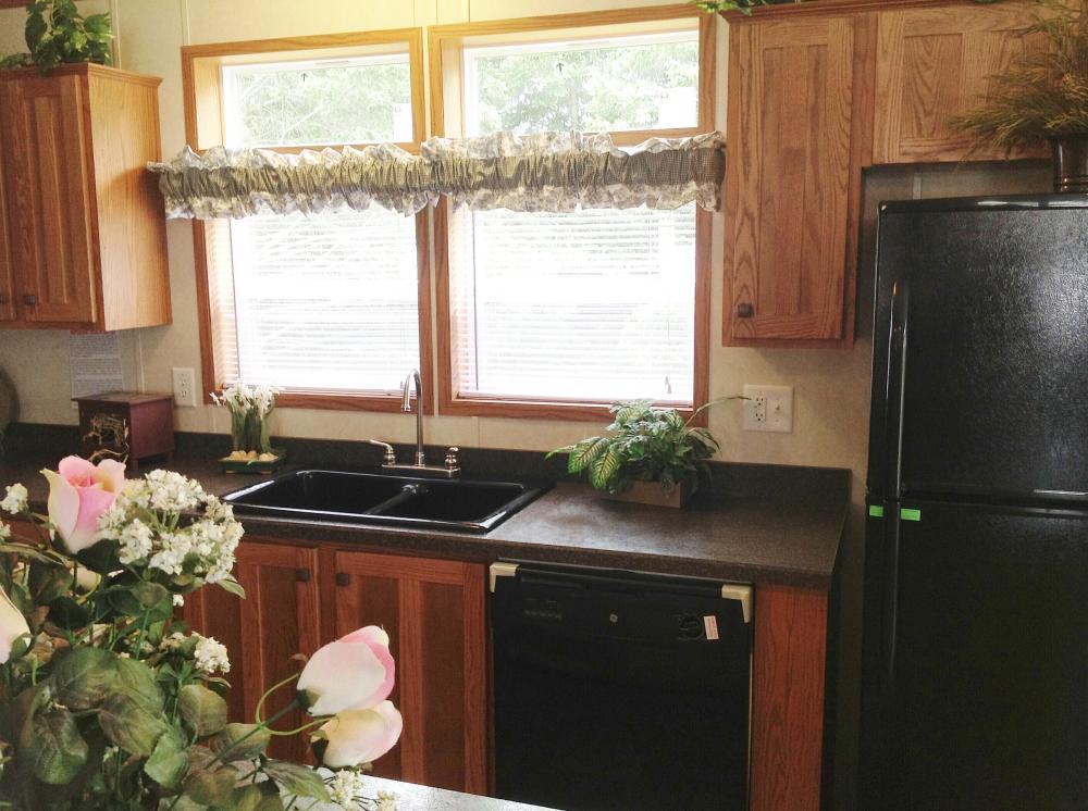 Transom Window , Shaker Oak cabinets, Black Sink