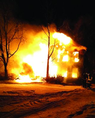 Sloansville blaze forces teen onto roof