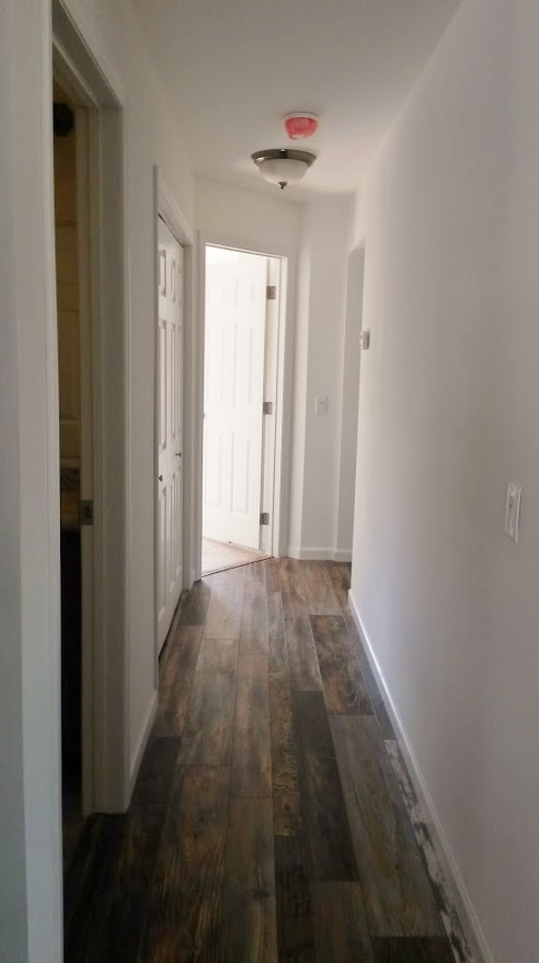 Displayed with laminate in hallway