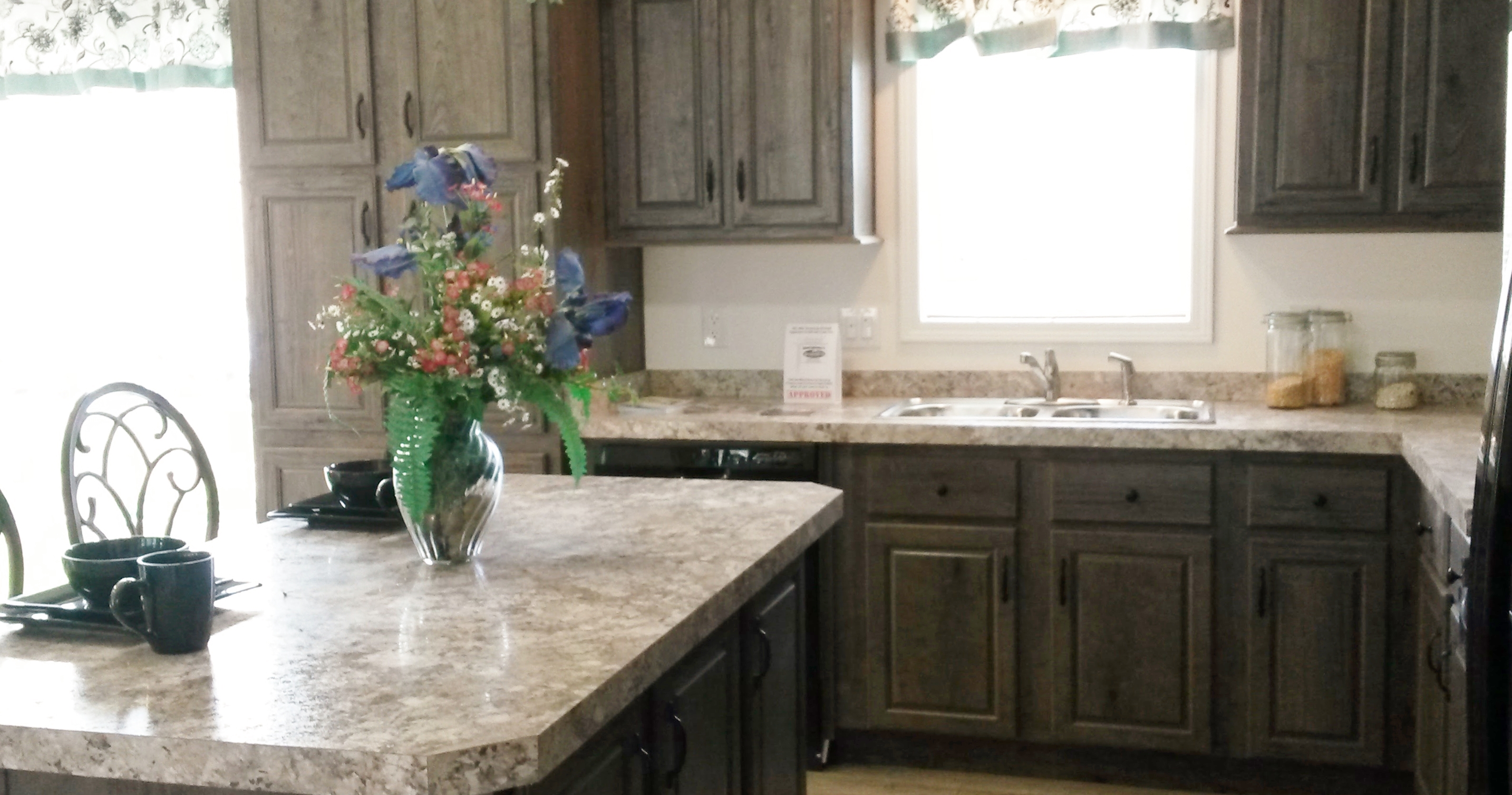 Island has cabinetry for added storage