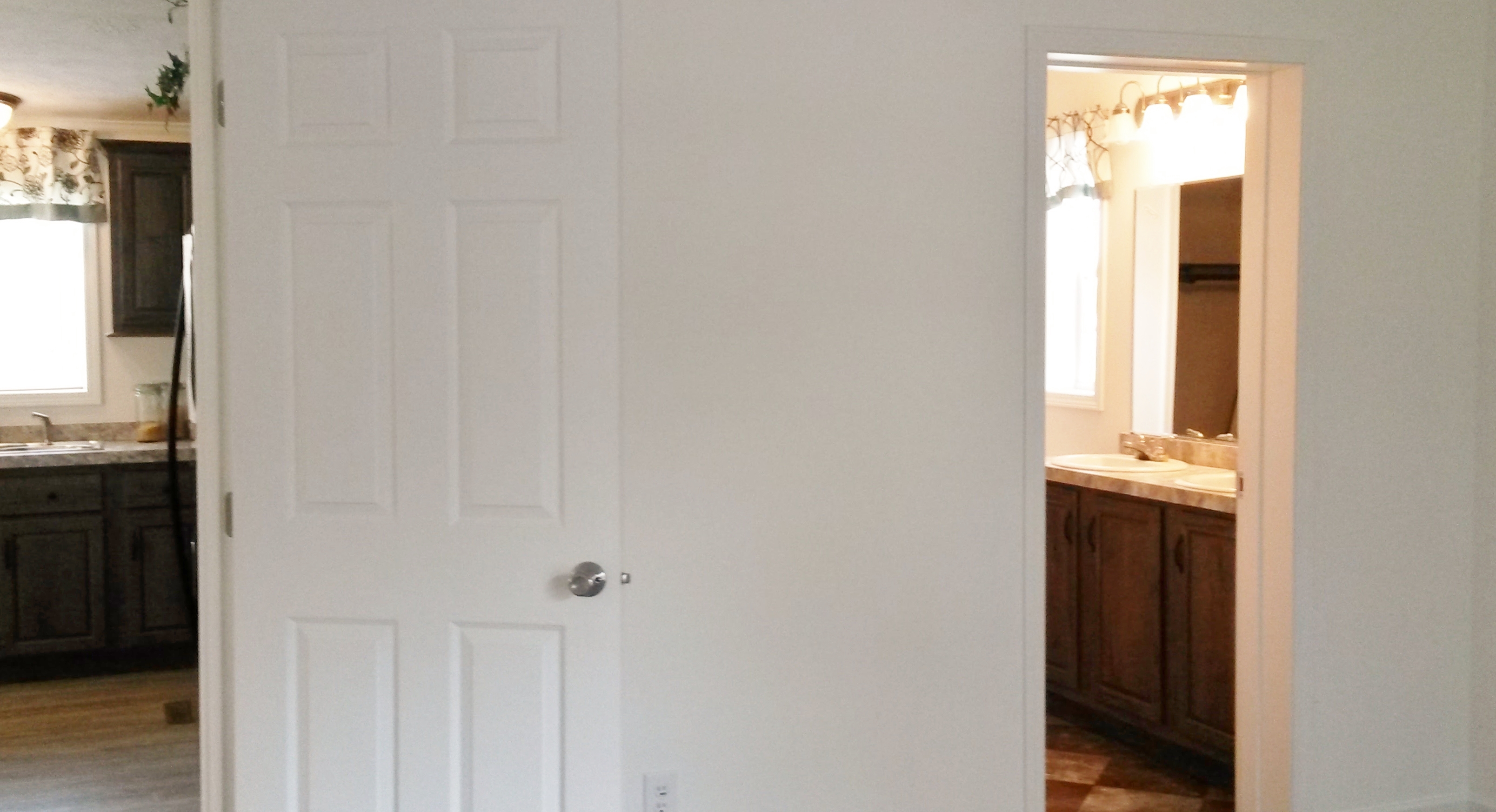 Master bedroom and bath off the kitchen