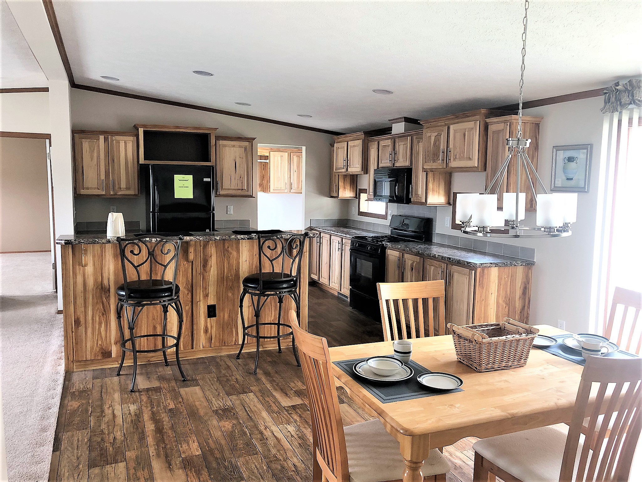 View Showing The Kitchen With Hickory Cabinets
