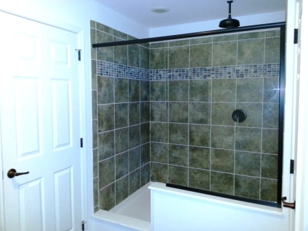 Walk-in tile shower in master bath.