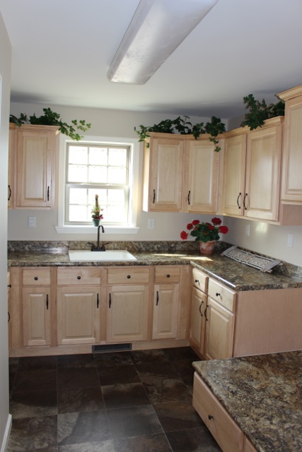 Utility room, lots of storage and platform for washer and dryer.