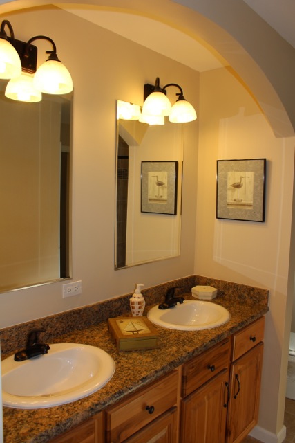 Double bowl sinks in master bath.