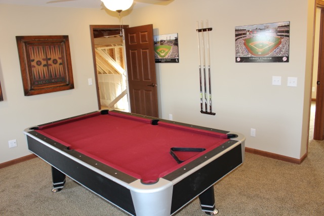 Off the game room is attic space.