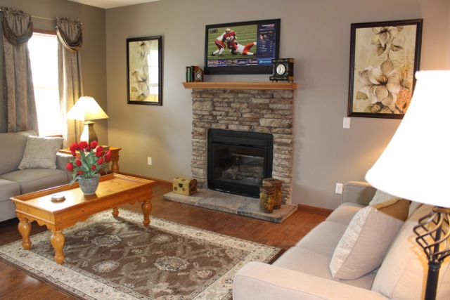 Shot of the living room with optional fireplace.